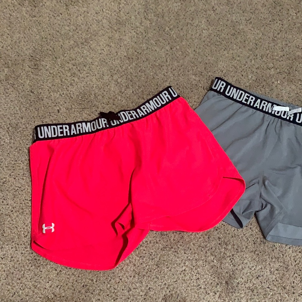 Under armor shorts . Pink and grey . Youth XL